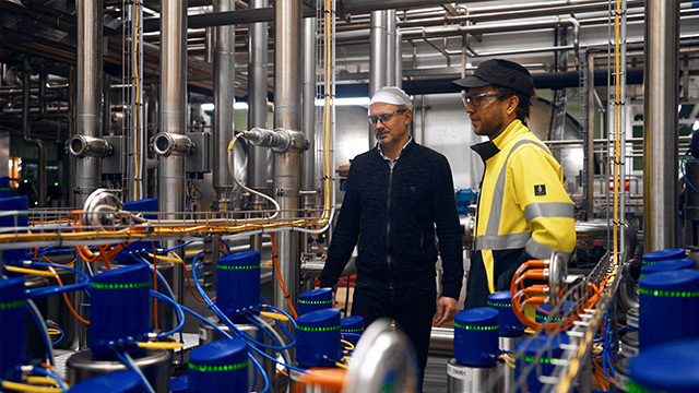 two men with alfa laval products